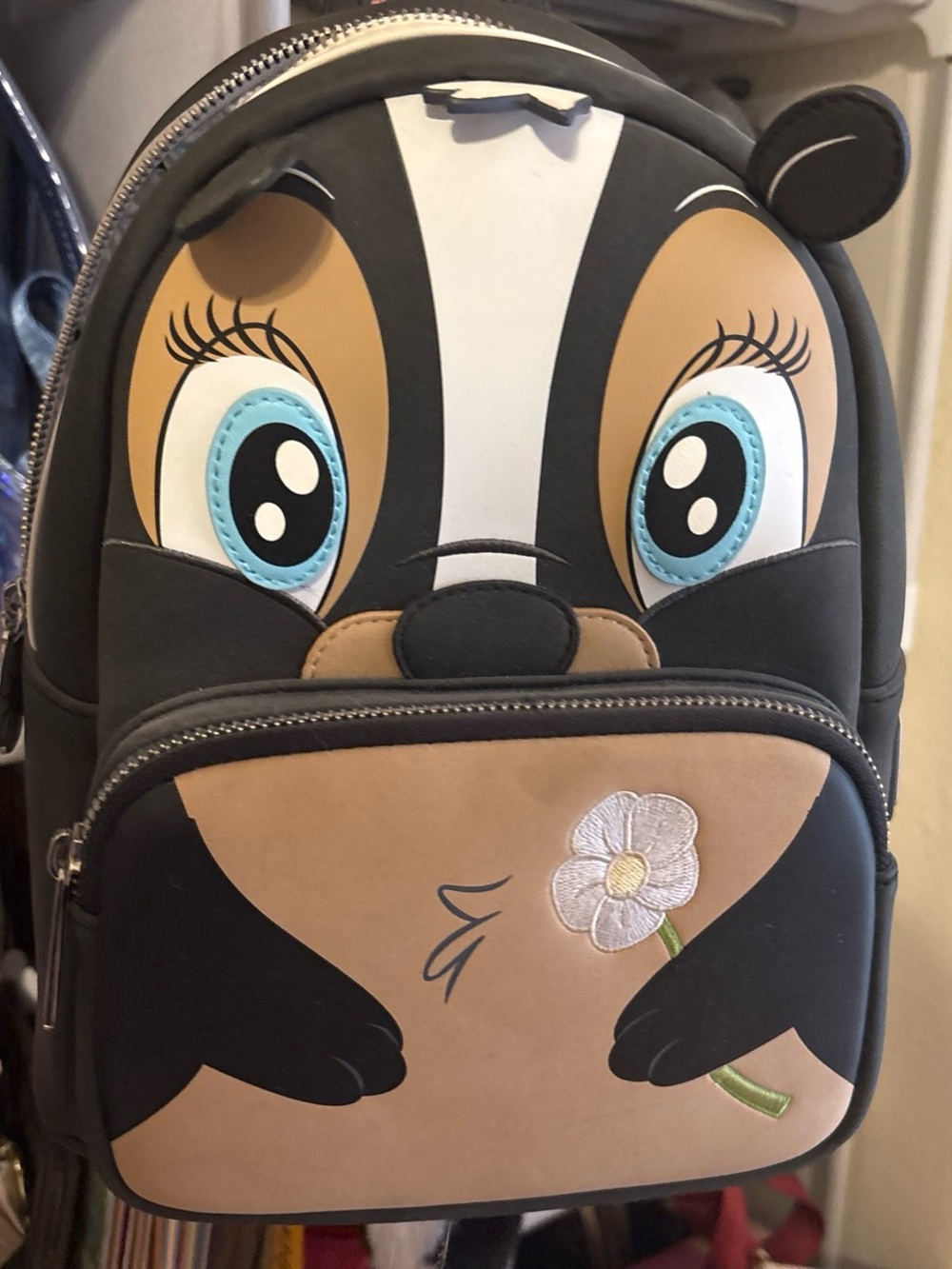 Loungefly Skunk Backpack in Black, Tan, White & Blue